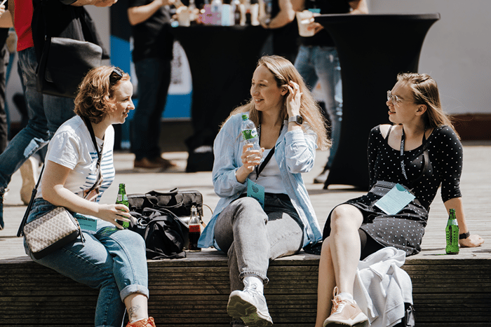 people networking in the sun