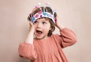 toddler with a home made crown