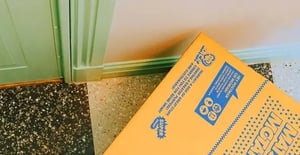 Motatos parcel on the hallway floor