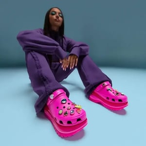 girl wearing crocs and tracksuit