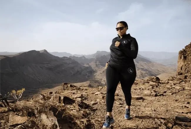 woman jogging at mountain sight