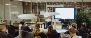 Man presenting to an audience