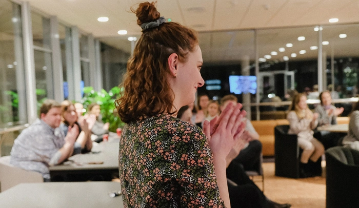 a woman clapping